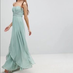 Dark blue tall strapless flowing dress